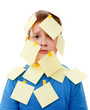 boy with memo posts on his face