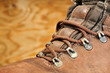Used boots on old  wooden floor