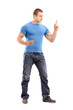Full length portrait of a violent young man threatening with fin