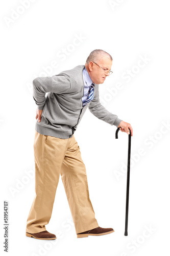 Photo: Full length portrait of a senior gentleman walking with cane and Full length portrait of a senior gentleman walking with cane and