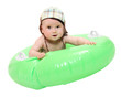 Little surfer on the inflatable life buoy.