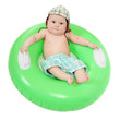 Little surfer on the inflatable life buoy.