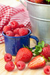 Fresh ripe strawberries and raspberries