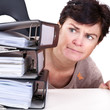 Woman looking at folders on the desk