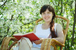  Relaxing  girl  in  bloom garden