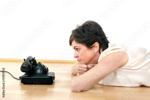 Photo: Woman waiting on call Woman waiting on call