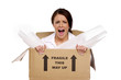 Business woman in a cardboard box