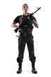 Police officer in body armour is holding a gun. Isolated on whit