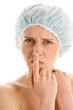 Woman with pimple on her nose