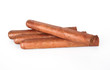 Four cigars isolated on white background