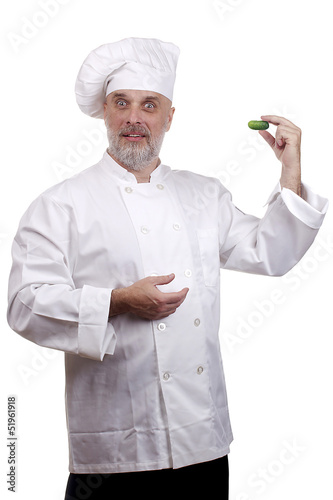 Photo: Chef with a cucumber Chef with a cucumber