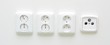 Closeup shot with white sockets and one radio TV socket.