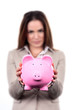 woman with pink piggy bank