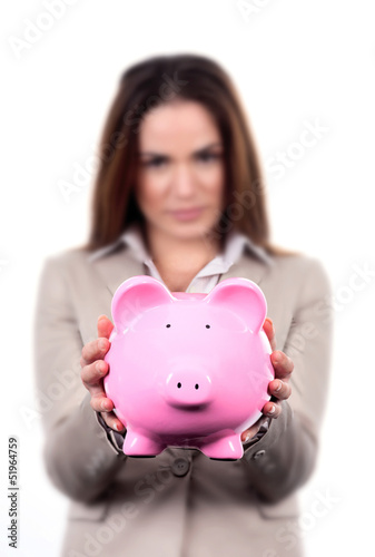 Photo: woman with pink piggy bank woman with pink piggy bank