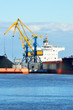 cargo ship loading in coal cargo terminal