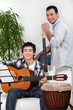 Foto: Father and son in music rehearsal Father and son in music rehearsal