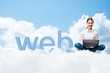 Photo: girl sitting cross-legged on the clouds girl sitting cross-legged on the clouds