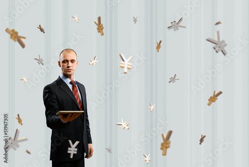 Photo: man holding tablet man holding tablet