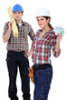 Foto: Carpenters with bank notes Carpenters with bank notes