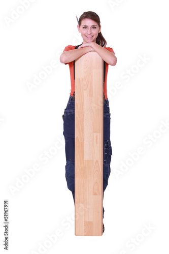 Photo: Woman with parquet slats Woman with parquet slats