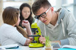 Photo: High School students. Group of excited students working in class High School students. Group of excited students working in class