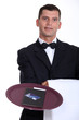 Photo: Waiter with the bill and a credit card Waiter with the bill and a credit card