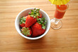 Bowl of Strawberries with a Small Cocktail