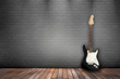Raum mit Holzboden, Ziegelwand und E-Gitarre schwarz