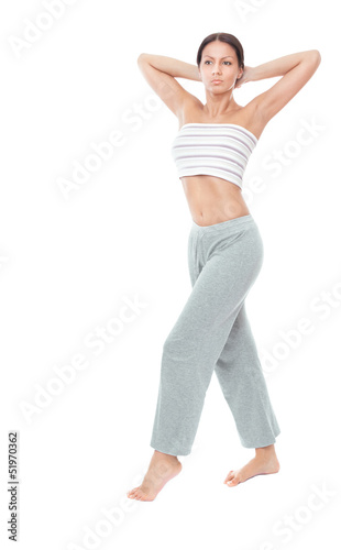 Photo: Pretty young woman doing exercise Pretty young woman doing exercise