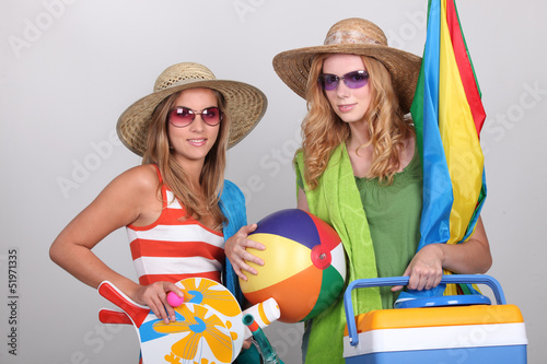 Photo: Two girls going to the beach Two girls going to the beach