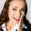 Businesswoman covering mouth, over gray