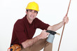 craftsman holding a welding torch
