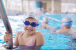 happy children group  at swimming pool