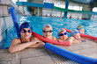 happy children group  at swimming pool