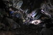 2 Caver in a cave, Pugnetto, Mezzenile, Piedmont, Italy