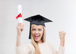 student in graduation cap with certificate