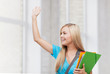student with folders