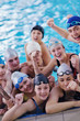 happy teen group  at swimming pool