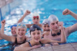 Photo: happy teen group at swimming pool happy teen group at swimming pool
