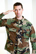 White male in army uniform saluting