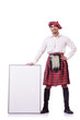 Scotsman with blank board on white