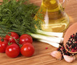 Olive oil with fresh vegetable and spices