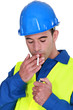 Handyman about to light a smoke.