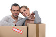 Couple stood with storage boxes