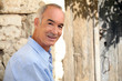 Photo: senior in his countryside house senior in his countryside house