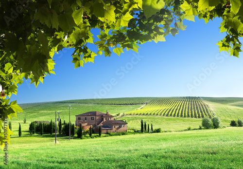 Photo: Tuscany landscape with typical farm house Tuscany landscape with typical farm house