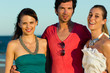 Man and women enjoy the sunset