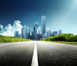 Asphalt road and modern city