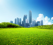 Photo: spring park and modern city spring park and modern city