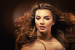 attractive woman with long hair and sexy smile